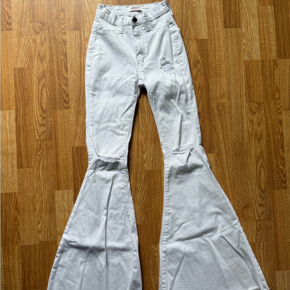 Vibrant MIU super flare distressed Denim Jeans
